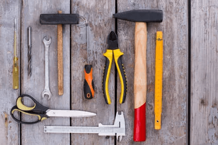 Hammers, pliers, screwdrivers, spanner and tape measure